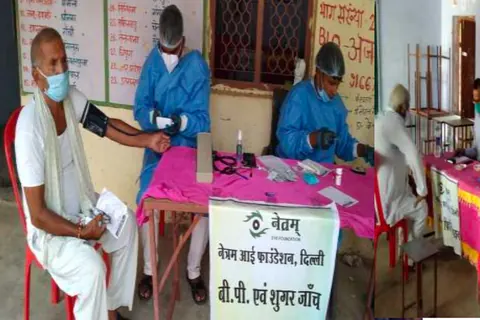 Patients being examined at an Eye Mela camp