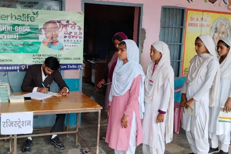 Registration at a Project Roshni school camp